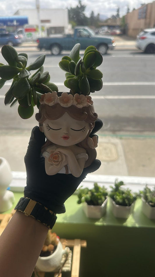 Whimsical Girl Planter with Lush Succulent Arrangement
